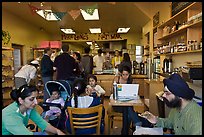 Indian family inside popular pizza restaurant, Haight-Ashbury district. San Francisco, California, USA ( color)