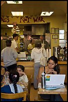 Tables and counter inside pizza restaurant, Haight-Ashbury district. San Francisco, California, USA ( color)