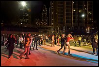 Holiday ice rink at night, Embarcadero Center. San Francisco, California, USA (color)