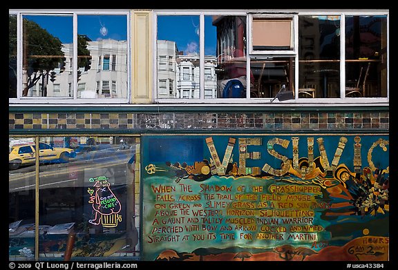 Beatnik area mural and windows with Vesuvio icon and many reflections, North Beach. San Francisco, California, USA