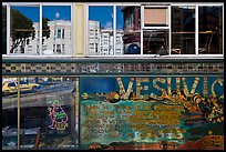 Beatnik area mural and windows with Vesuvio icon and many reflections, North Beach. San Francisco, California, USA