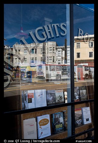 City Light Bookstore storefront with street reflections, North Beach. San Francisco, California, USA