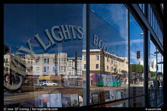 City Light Bookstore window glass and city reflections, North Beach. San Francisco, California, USA (color)
