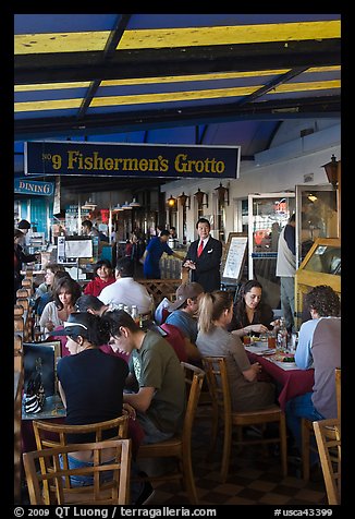 Outdoor terrace of seafood restaurant, Fishermans wharf. San Francisco, California, USA (color)