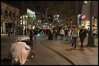 People walking past mime on Third Street Promenade. Santa Monica, Los Angeles, California, USA (color)