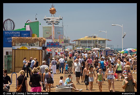 Summer crowds on Santa Monica Pier. Santa Monica, Los Angeles, California, USA (color)