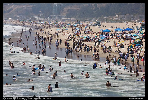 Throng of beachgoers, Santa Monica Beach. Santa Monica, Los Angeles, California, USA (color)