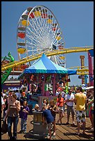 Families, amusement park and ferris wheel. Santa Monica, Los Angeles, California, USA