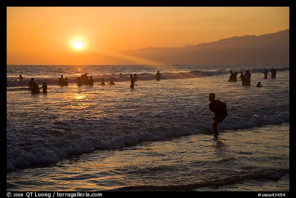 Sunset on beach shore, Santa Monica Beach. Santa Monica, Los Angeles, California, USA (color)