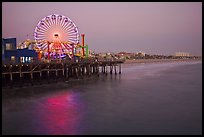 Ferris Wheel and beach at dusk, Santa Monica Pier. Santa Monica, Los Angeles, California, USA