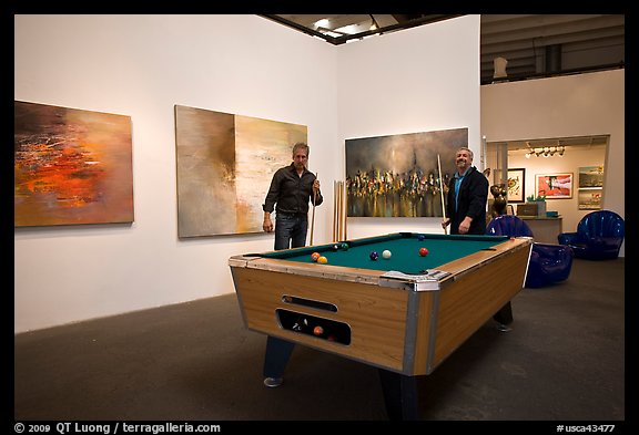 Playing pool inside a contemporary art gallery, Bergamot Station. Santa Monica, Los Angeles, California, USA (color)