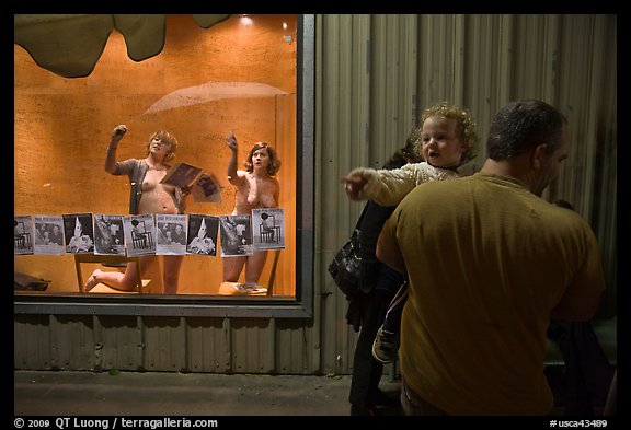 Toddler echoing performance artists, Bergamot Station. Santa Monica, Los Angeles, California, USA