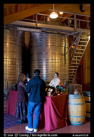 Couple tasting wine. Napa Valley, California, USA (color)