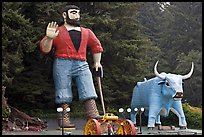 Giant figures of Paul Buyan and cow. California, USA (color)