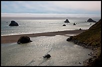 Shimmering ocean and river separated by sliver of sand, Jenner. Sonoma Coast, California, USA (color)