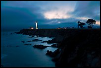 Coastal bluff with lighthouse at dusk, Point Arena. California, USA (color)
