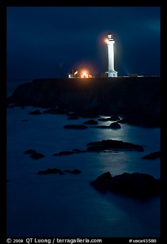 Lighthouse and reflection in surf at night, Point Arena. California, USA