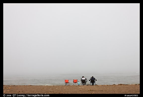 Sitting in front of foggy ocean, Manchester State Park. California, USA (color)