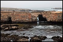 Sea cliffs with sea arches. California, USA (color)