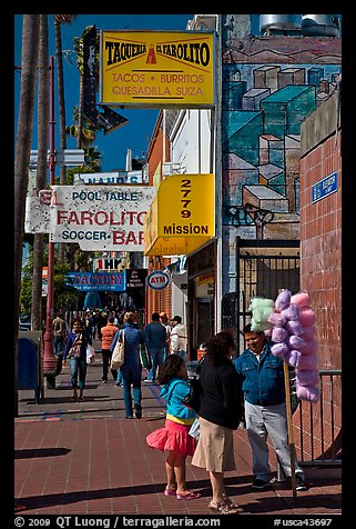 Mission street sidewalk, Mission District. San Francisco, California, USA (color)
