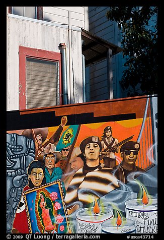 Political mural and facade detail, Mission District. San Francisco, California, USA (color)