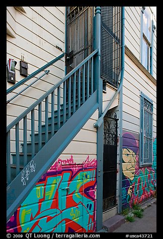 Mural at the bottom of house facade, Mission District. San Francisco, California, USA (color)
