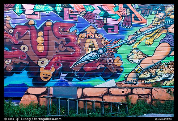 Ladder and mural, Mission District. San Francisco, California, USA