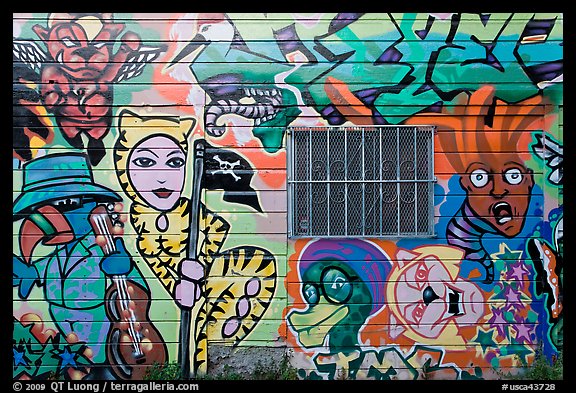 Painted wall and window, Mission District. San Francisco, California, USA