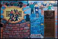 Political mural and door, Mission District. San Francisco, California, USA (color)