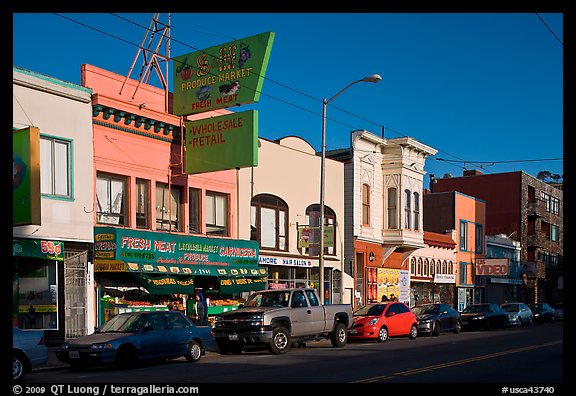 Shops, Mission Street, late afternoon, Mission District. San Francisco, California, USA (color)