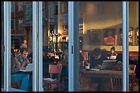 Cafe seen through windows, Mission District. San Francisco, California, USA ( color)