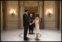 Couple taking marriage wows, City Hall. San Francisco, California, USA