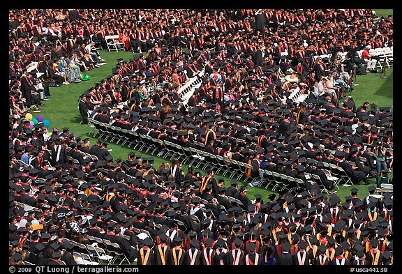 Large gathering of students in academic dress at graduation ceremony. Stanford University, California, USA