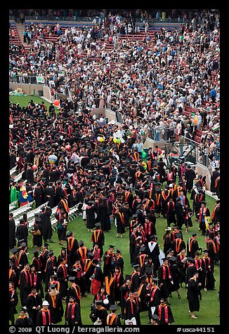 Graduates gather in front of family and friends after commencement. Stanford University, California, USA