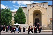 Graduates walking single file into Memorial auditorium. Stanford University, California, USA (color)