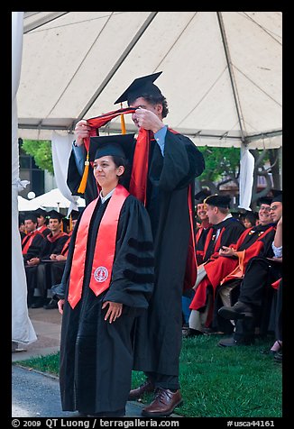 Professor confers doctoral scarf to student. Stanford University, California, USA (color)