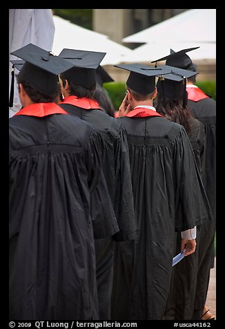 Graduates with robes and square caps seen from behind. Stanford University, California, USA