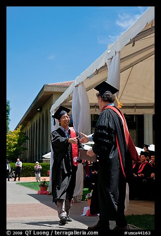 Student receiving handshake prior diploma award. Stanford University, California, USA