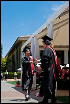 Student receiving handshake prior diploma award. Stanford University, California, USA