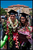 Graduates wearing flower garlands. Stanford University, California, USA (color)