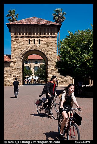 Students riding bicycles through Main Quad. Stanford University, California, USA (color)