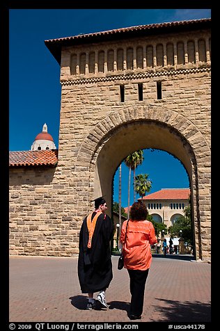 Graduate and family member walking through Main Quad. Stanford University, California, USA