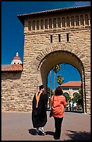 Graduate and family member walking through Main Quad. Stanford University, California, USA