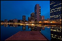 High-rise buildings, deck, and Lake Meritt, dusk. Oakland, California, USA ( color)