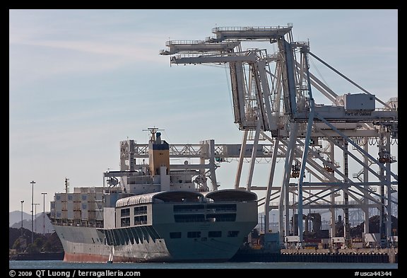 Cranes and cargo ship, Oakland port. Oakland, California, USA
