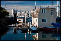 Houseboat and Oakland skyline. Oakland, California, USA