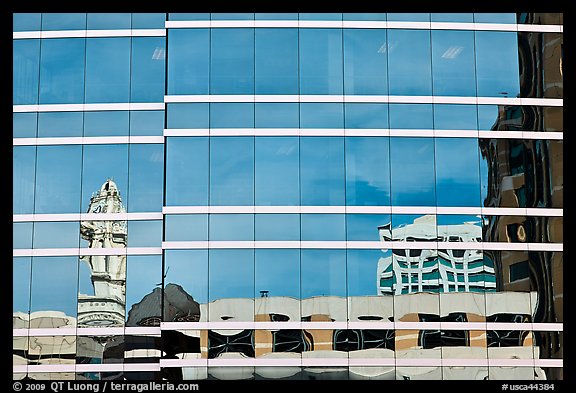 Reflections in glass buiding. Oakland, California, USA (color)