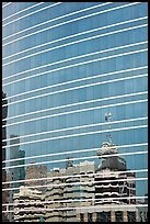 Federal building reflected in glass facade. Oakland, California, USA (color)