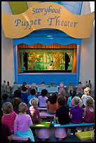 Children look at Snow white puppet show, Fairyland. Oakland, California, USA ( color)