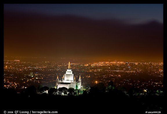 Oakland temple above the Bay by night. Oakland, California, USA